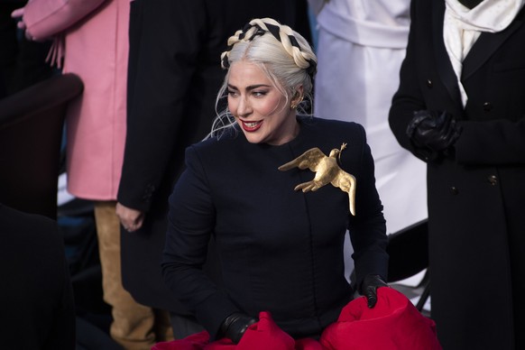 Lady Gaga returns from the podium after signing the National Anthem during the 59th Presidential Inauguration at the U.S. Capitol for President-elect Joe Biden in Washington, Wednesday, Jan. 20, 2021. ...