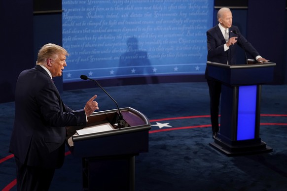 FILE - President Donald Trump and Democratic presidential candidate former Vice President Joe Biden exchange points during the first presidential debate Sept. 29, 2020, at Case Western University and  ...