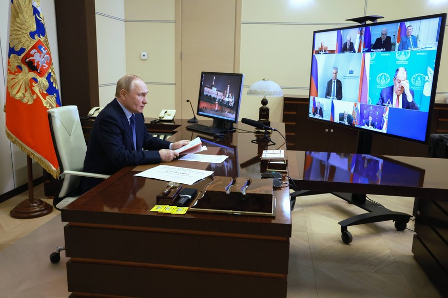 Russia Putin Security Council 8718381 28.06.2024 Russian President Vladimir Putin chairs a meeting with members of the Security Council via videoconference at the Novo-Ogaryovo state residence, outsid ...
