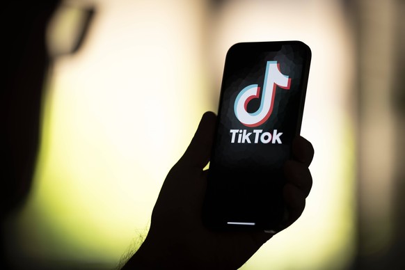Social Media User Illustration Photos The TikTok logo is seen in this photo illustration on 22 August, 2023 in Warsaw, Poland. Warsaw Poland PUBLICATIONxNOTxINxFRA Copyright: xJaapxArriensx originalFi ...