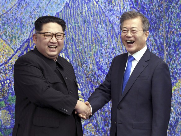 FILE - In this April 27, 2018, file photo, North Korean leader Kim Jong Un, left, poses with South Korean President Moon Jae-in for a photo inside the Peace House at the border village of Panmunjom in ...