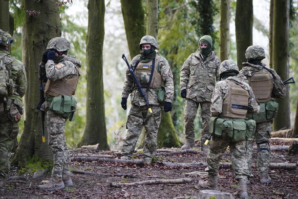 Ukrainian soldiers during training on Salisbury Plain in Wiltshire, Britain, where Australian Armed Forces are supporting the UK-led training of Ukrainian recruits, Wednesday Feb. 1, 2023. (Ben Bircha ...