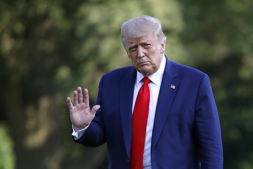 President Donald Trump walks on the South Lawn of the White House in Washington, Wednesday, July 15, 2020, after stepping off Marine One. Trump is returning from Atlanta. (AP Photo/Patrick Semansky)