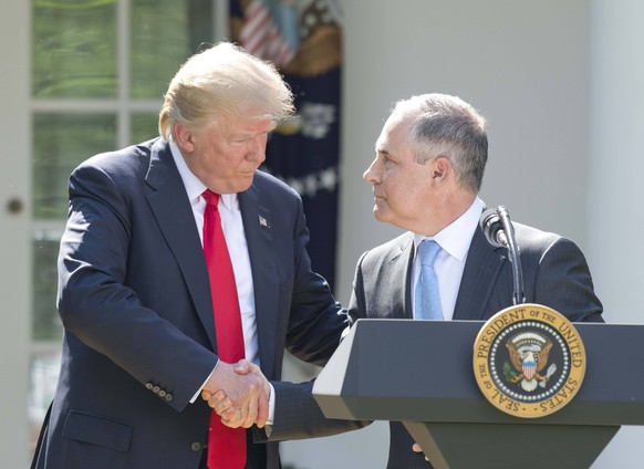 June 1, 2017 - Washington, District of Columbia, United States of America - United States President Donald J. Trump shakes hands with EPA Administrator Scott Pruitt after making a statement regarding  ...