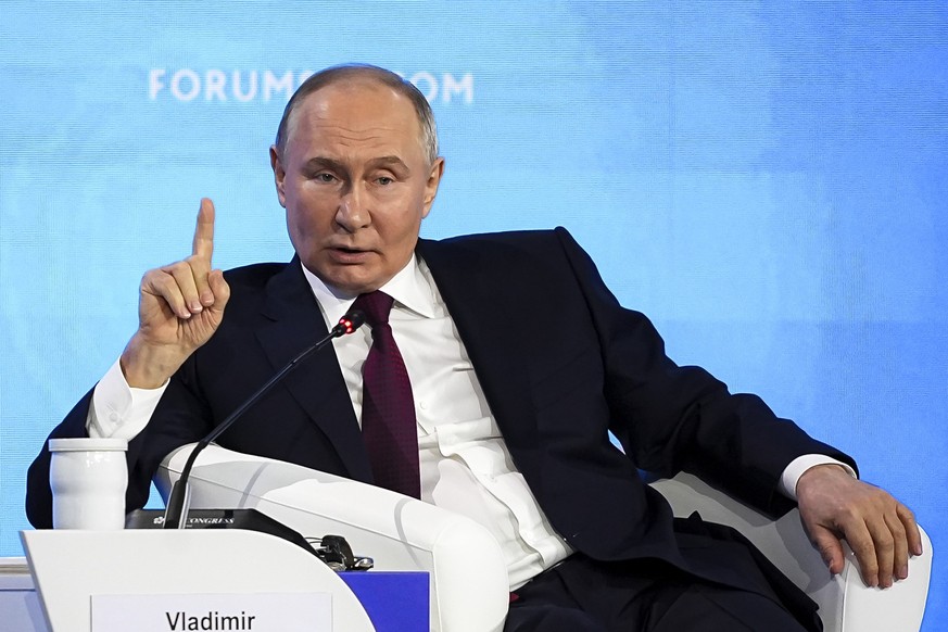 In this photo released by the Roscongress Foundation, Russian President Vladimir Putin gestures as he speaks at a plenary session at the Eastern Economic Forum in St. Petersburg, Russia, Friday, June  ...