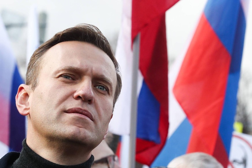 MOSCOW, RUSSIA - FEBRUARY 29, 2020: Opposition activist Alexei Navalny takes part in a memorial march marking the 5th anniversary of the assassination of opposition activist Boris Nemtsov. Boris Nemts ...