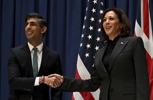 Britain&#039;s Prime Minister Rishi Sunak, left, shakes hands with US Vice President Kamala Harris as they meet at the Munich Security Conference (MSC) in Munich, Germany, Saturday, Feb. 18, 2023. The ...
