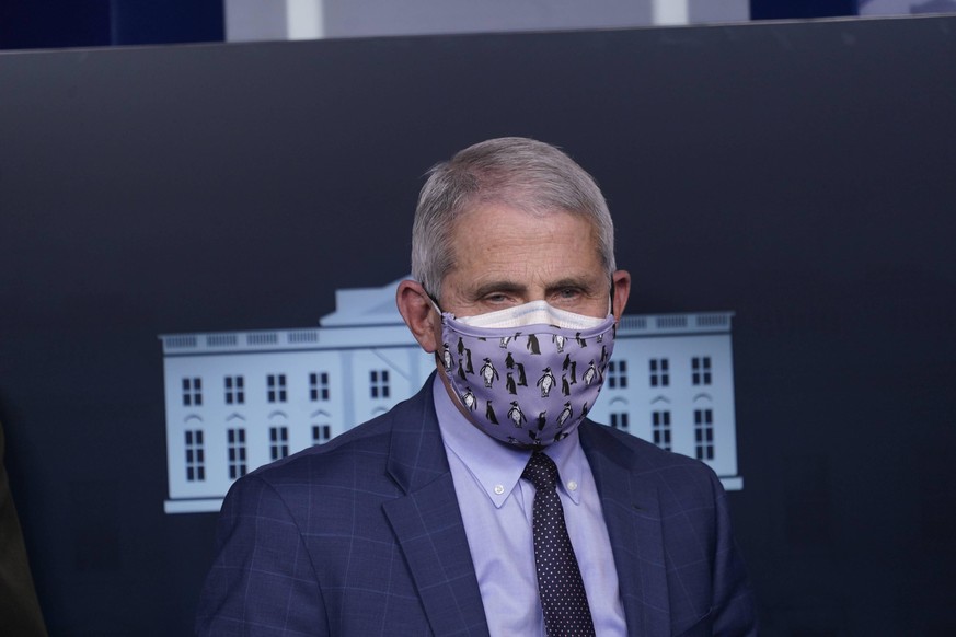 Dr. Anthony Fauci, director of the National Institute of Allergy and Infectious Diseases at the National Institutes of Health, participates in a briefing with members of the White House Coronavirus Ta ...