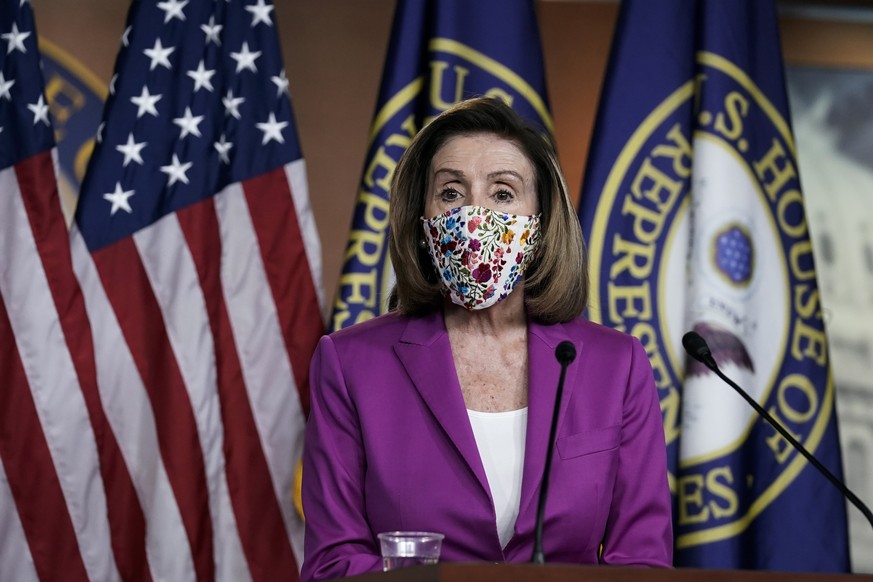 Speaker of the House Nancy Pelosi, D-Calif., holds a news conference on the day after violent protesters loyal to President Donald Trump stormed the U.S. Congress, at the Capitol in Washington, Thursd ...