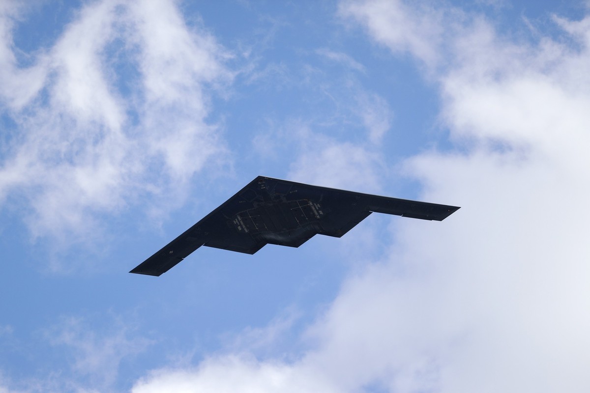 FILE - A B-2 Spirit stealth bomber, assigned to the 509th/131st Bomb Wings out of Whiteman Air Force Base, performs a flyover of Barnes-Jewish Hospital to honor healthcare professionals and essential  ...