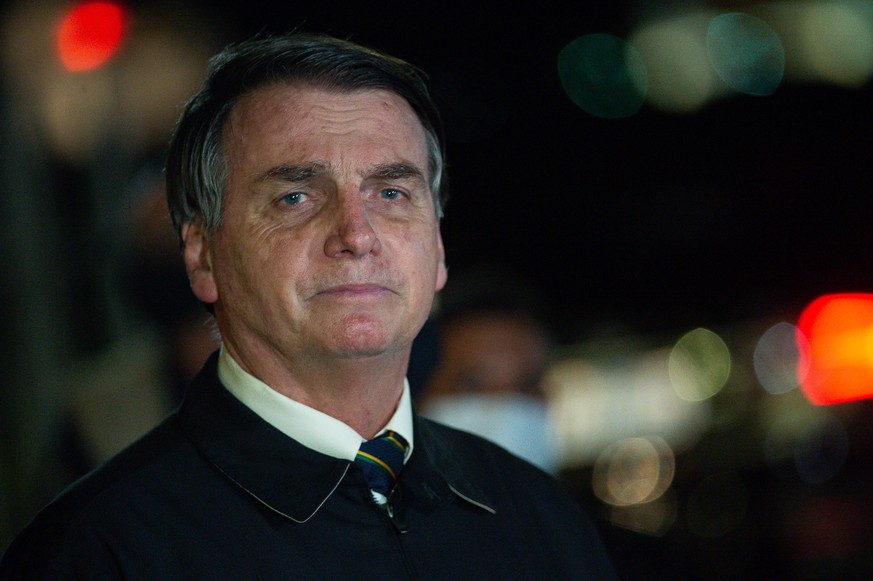 BRASILIA, BRAZIL - MAY 22: President of Brazil Jair Bolsonaro speaks with press about the controversial cabinet meeting video recently disclosed on May at Alvorada Palace on May 22, 2020 in Brasilia.  ...
