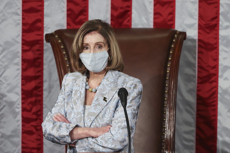 House Speaker Nancy Pelosi waits during votes during the first session of the 117th Congress at the U.S. Capitol in Washington, Sunday, Jan. 3, 2021. (Tasos Katopodis/Pool via AP)