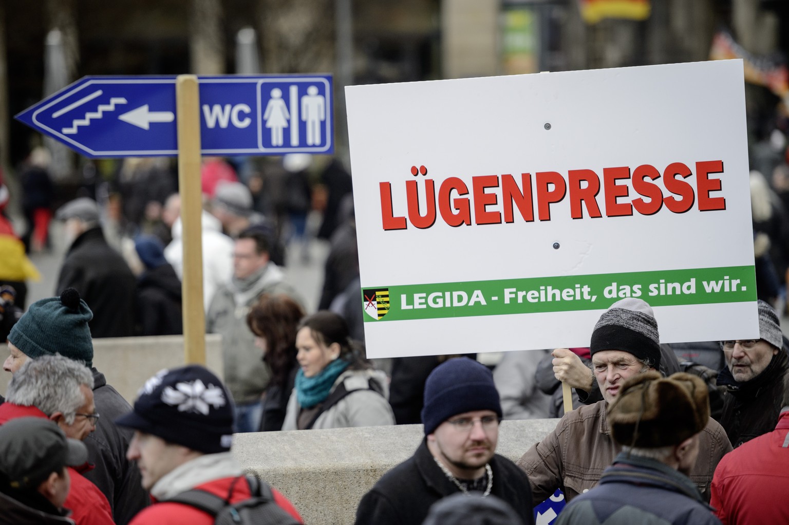 DRESDEN, GERMANY - APRIL 06: Supporters of the Pegida movement gather for another of their weekly protests on Easter Monday at a rally on April 6, 2015 in Dresden, Germany. The Pegida movement, which  ...