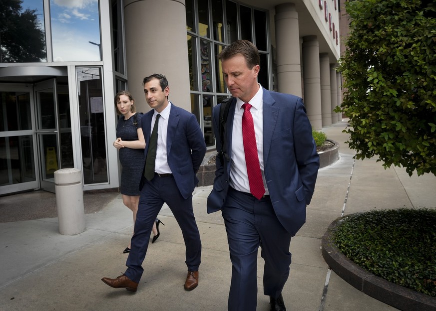 Dr. Eithan Haim, left, and his attorney, Ryan Patrick, right, leave federal court after appearing for an arraignment hearing Monday, June 17, 2024 in Houston. Haim, who calls himself a whistleblower o ...