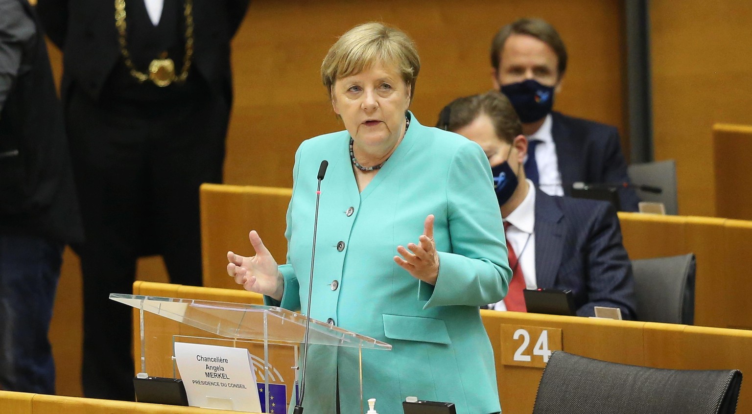 BRUSSELS, BELGIUM - JULY 08: German Chancellor Angela Merkel makes a speech as she attends a plenary session at The European Parliament in Brussels, Belgium on July 8, 2020. Germany holds the term pre ...