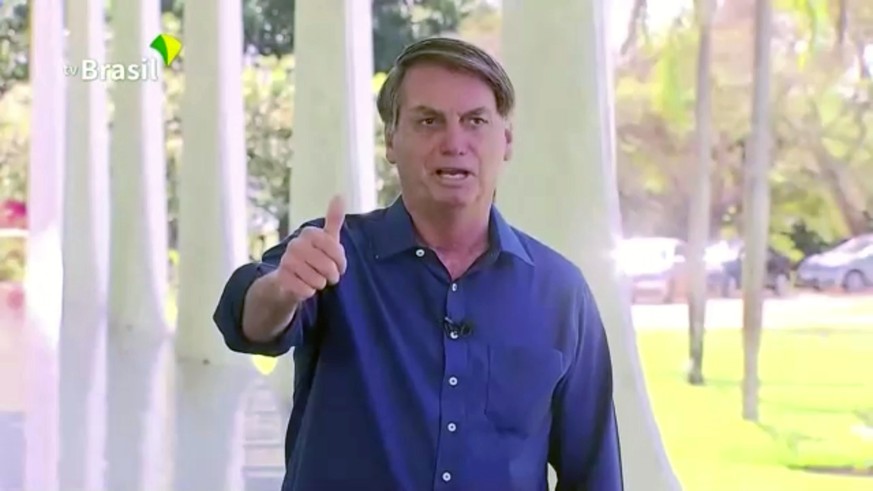 Brazil&#039;s President Jair Bolsonaro gestures as he speaks to the media on his positive coronavirus diagnosis in Brasilia, Brazil July 7, 2020 in this still image taken from video. Brazilian Governm ...