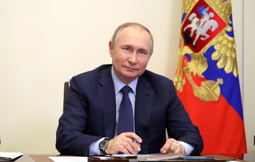 Russia Putin 8149715 25.03.2022 Russian President Vladimir Putin meets with young award-winning culture professionals via teleconference call at the Kremlin in Moscow, Russia. Mikhail Klimentyev / Spu ...