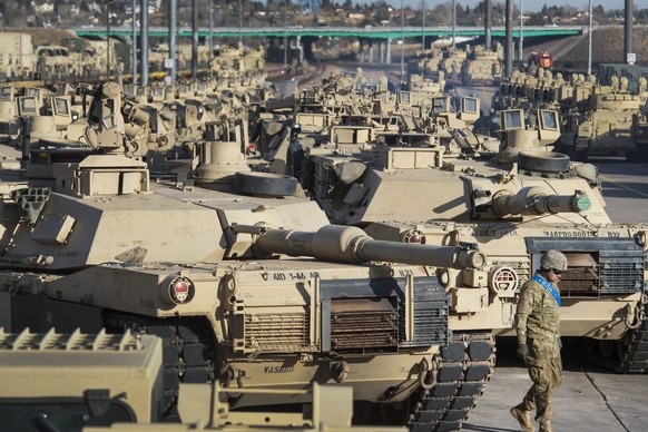 FILE - A soldier walks past a line of M1 Abrams tanks, Nov. 29, 2016, at Fort Carson in Colorado Springs, Colo. U.S. officials say the Pentagon is speeding up its delivery of Abrams tanks to Ukraine,  ...