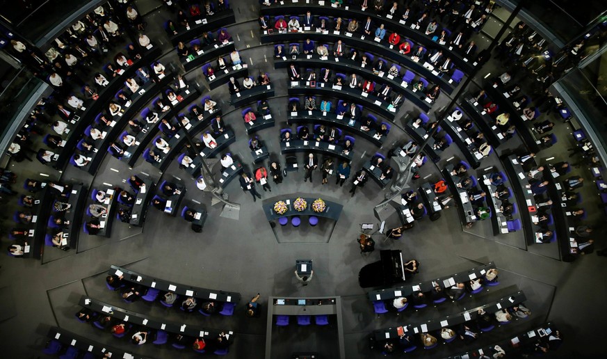 FILE - In this Thursday, Jan. 17, 2019 file photo German lawmakers attend a special parliament session at the Reichstag building, host of the German federal parliament, Bundestag, in Berlin, Germany.  ...