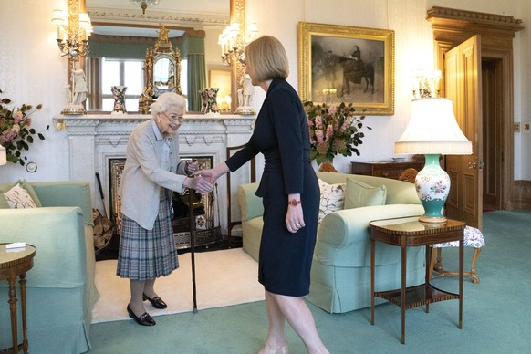 . 06/09/2022. Balmoral, United Kingdom. Queen Elizabeth II welcomes Liz Truss, during an audience at Balmoral, Scotland, where she invited the newly elected leader of the Conservative party to become  ...
