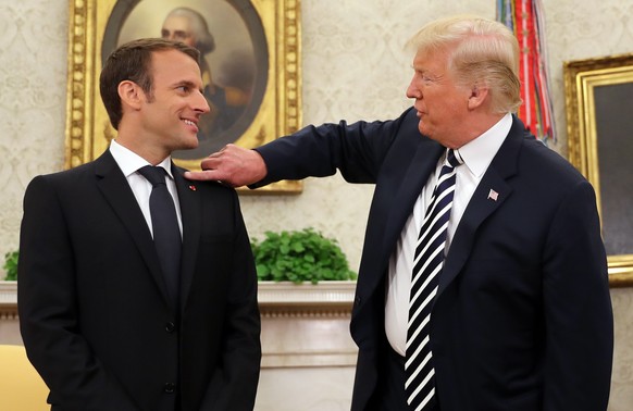 President Donald Trump and French President Emmanuel Macron talk in the Oval Office of the White House in Washington, Tuesday, April 24, 2018. (AP Photo/Pablo Martinez Monsivais)