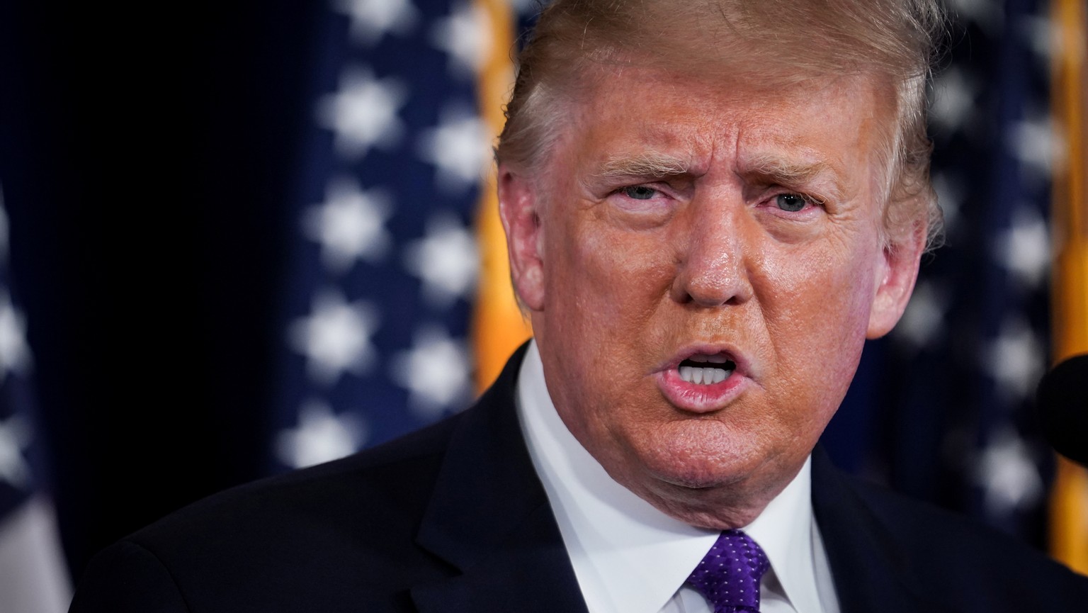 U.S. President Donald Trump speaks during a news conference at Trump National Golf Club in Bedminster, New Jersey, U.S., August 15, 2020. REUTERS/Sarah Silbiger