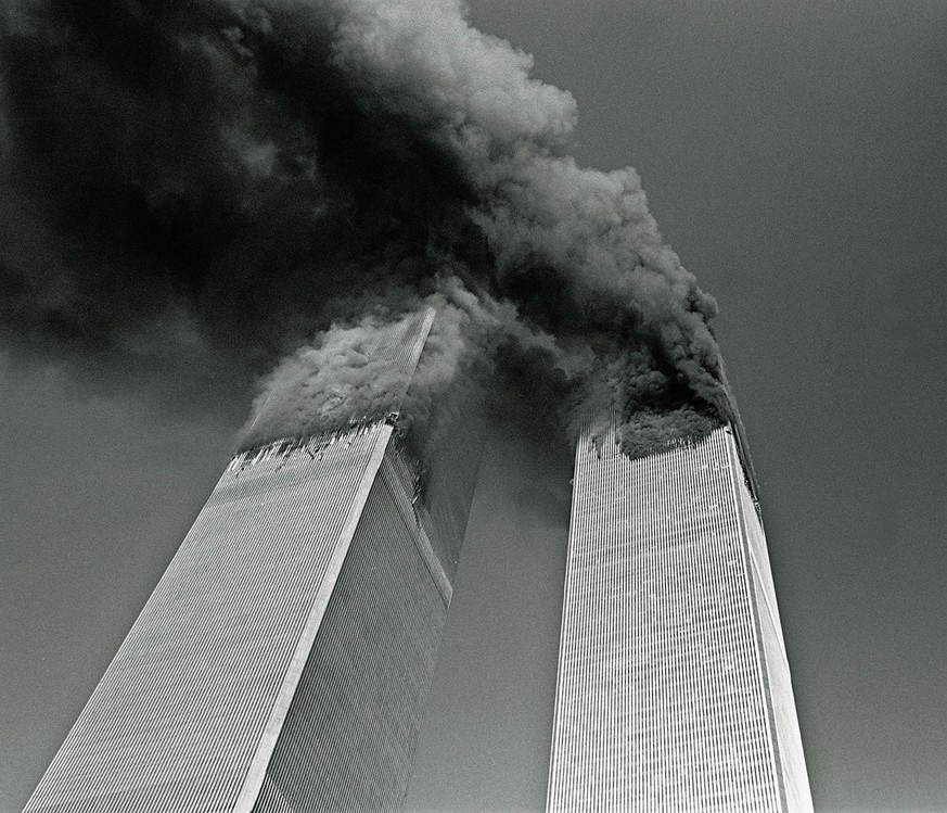 Sep 11, 2001; New York, New York, USA; Smoke billows from the twin towers of the World Trade Center in New York Tuesday Sept. 11. 2001.In the most horrifying attacks ever against the United States, te ...