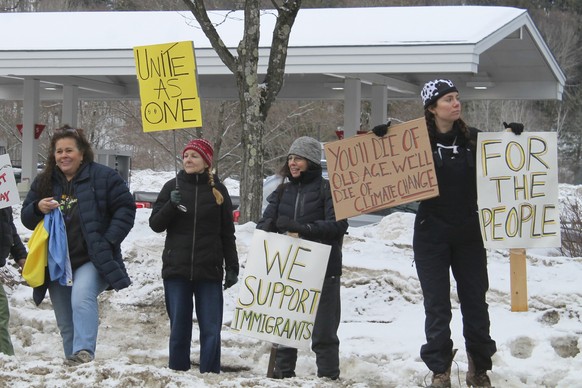 Protesters line Main Street in Waitsfield, Vt., to protest Vice President JD Vance&#039;s visit on Saturday, March 1, 2025. (Erin Minichiello via AP).