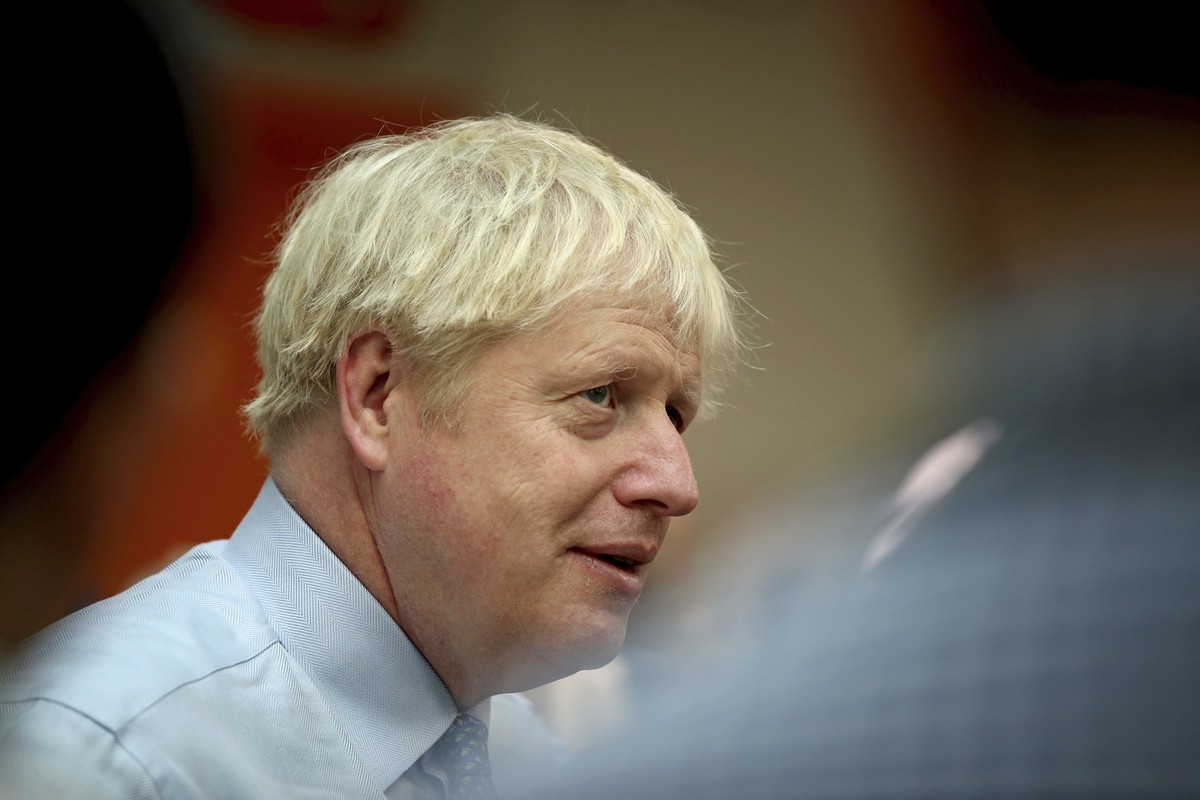 Britain's Prime Minister Boris Johnson visits Whipps Cross University Hospital in Leytonstone, east London, Wednesday Sept. 18, 2019. (Yui Mok/Pool via AP)