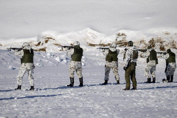 Reservists of the Karelia Brigade shoot with live rounds during the Etela-Karjala 22 South Karelia 22 local defence exercise in Taipalsaari, south-eastern Finland, on March 9, 2022. The Finnish Army e ...