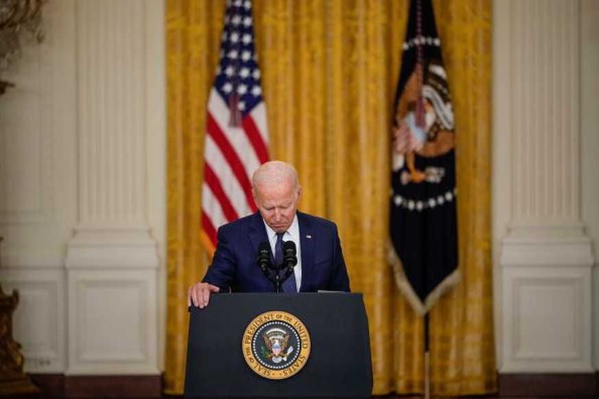 WASHINGTON, DC - AUGUST 26: U.S. President Joe Biden pauses while he speaks about the situation in Afghanistan in the East Room of the White House on August 26, 2021 in Washington, DC. At least 12 Ame ...