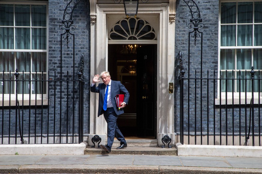 July 6, 2022, London, England, United Kingdom: UK Prime Minister BORIS JOHNSON leaves 10 Downing Street ahead of the weekly Prime Minister s Questions session in the House of Commons amid resignations ...