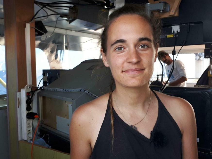 Sea-Watch 3 captain Carola Rackete is seen on board the vessel at sea in the Mediterranean, just off the coasts of the southern Italian island of Lampedusa, Thursday, June 27, 2019. The captain of the ...