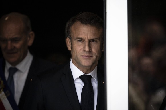 Emmanuel Macron And Brigitte Macron At The Polling Station - Le Touquet France s President Emmanuel Macron looks and gestures after his vote in the second round of France s legislative election at a p ...