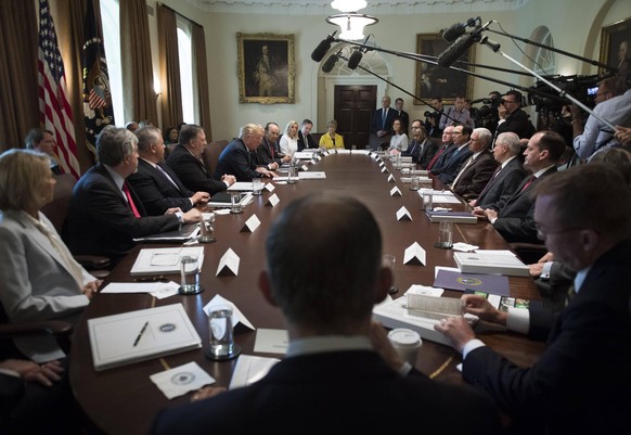 President Donald Trump speaks to the media during a Cabinet meeting at the White House in Washington, D.C. on June 21, 2018. Trump spoke about border security and family separation for those caught cr ...