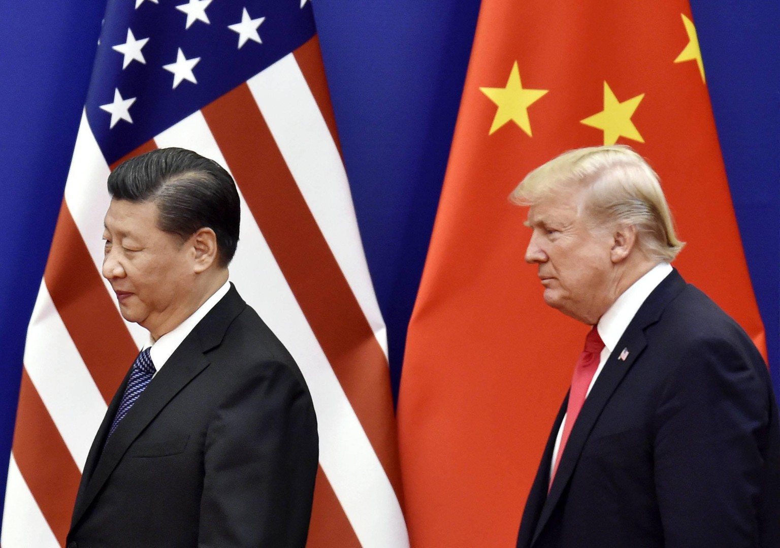 Trump and Xi File photo taken in November 2017 shows U.S. President Donald Trump R and Chinese President Xi Jinping at the Great Hall of the People in Beijing. PUBLICATIONxINxGERxSUIxAUTxHUNxONLY