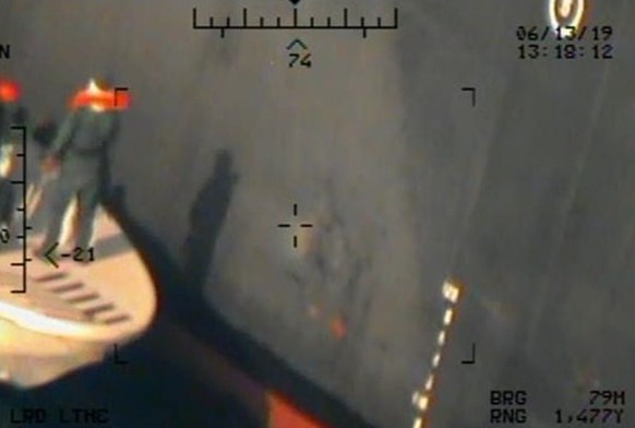 A U.S. military image released by the Pentagon in Washington on June 17, which is says was taken from a U.S. Navy MH-60R helicopter in the Gulf of Oman in waters between Gulf Arab states and Iran on J ...