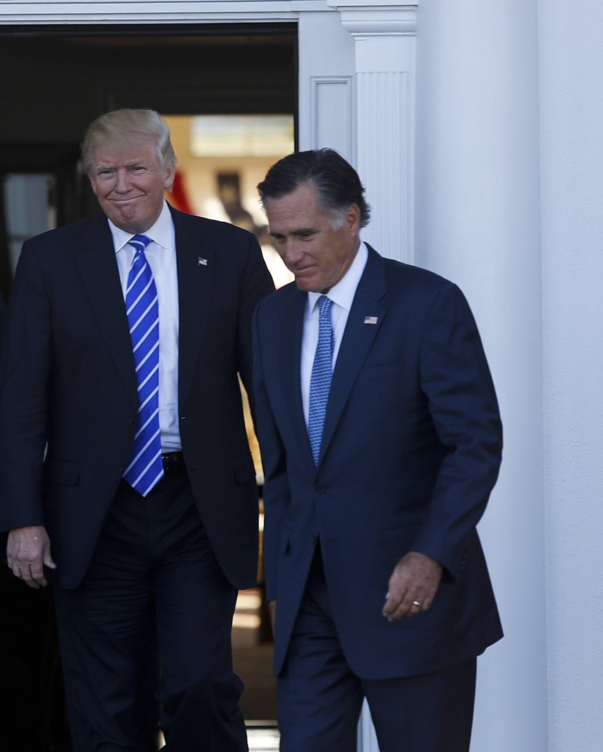 Mitt Romney leaves after meeting with President-elect Donald Trump and Vice President-elect Mike Pence at the clubhouse at Trump International Golf Club, November 19, 2016 in Bedminster Township, New  ...