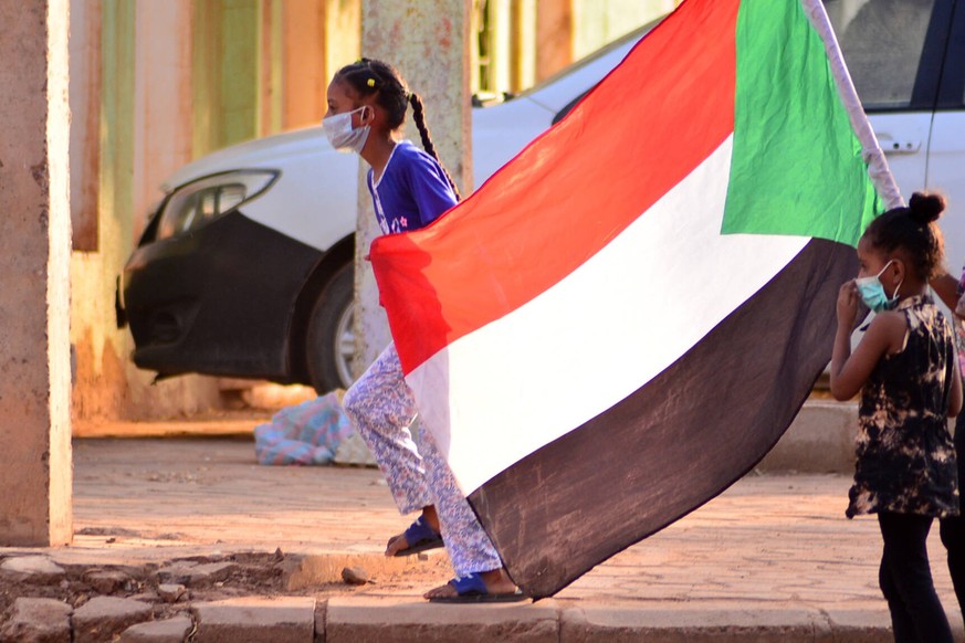 June 30, 2020, Khartoum, Khartoum, Sudan: Sudanese protesters chant during a protest on Sixty street in the east of the capital Khartoum, on June 30, 2020. Tens of thousands of Sudanese took to the st ...