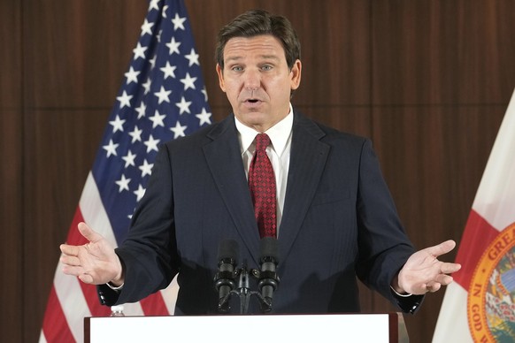 Governor Ron DeSantis gestures during a news conference where he spoke of new law enforcement legislation that will be introduced during the upcoming session, Thursday, Jan. 26, 2023, in Miami. (AP Ph ...