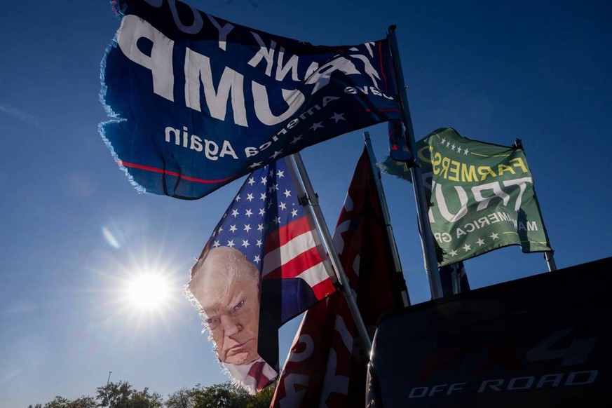 US-NEWS-CALIF-TRUMP-5-SA Flags supporting President-elect Donald Trump, tattered from more than a year s worth of caravans, wave from the back of Teresa Bozynski s truck before the start of the Freedo ...