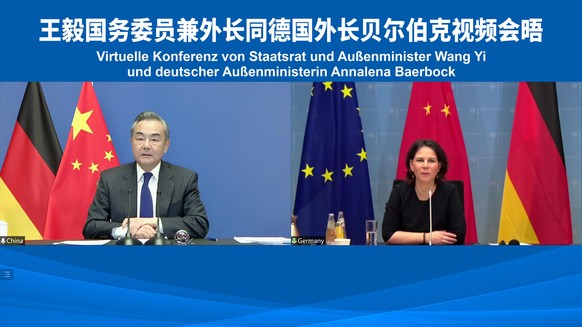 (220120) -- BEIJING, Jan. 20, 2022 (Xinhua) -- Chinese State Councilor and Foreign Minister Wang Yi holds talks with German Foreign Minister Annalena Baerbock via video link on Jan. 20, 2022. (Xinhua)