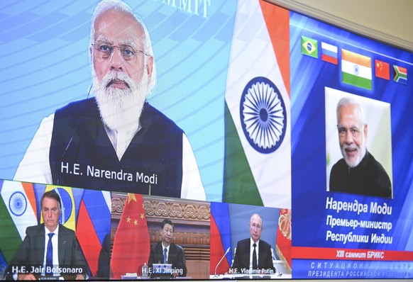 MOSCOW, RUSSIA - SEPTEMBER 9, 2021: Russia&#039;s President Vladimir Putin attends the 13th BRICS Summit via videoconference at the Moscow Kremlin. The summit is held via videoconference and chaired b ...