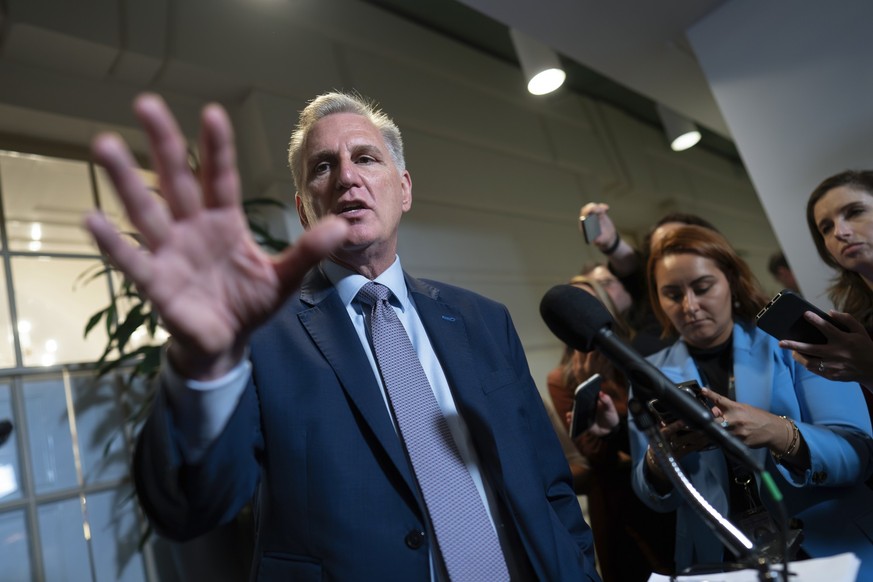 Speaker of the House Kevin McCarthy, R-Calif., briefs reporters following a closed-door Republican Conference meeting on how to agree on a path to funding the government, at the Capitol in Washington, ...