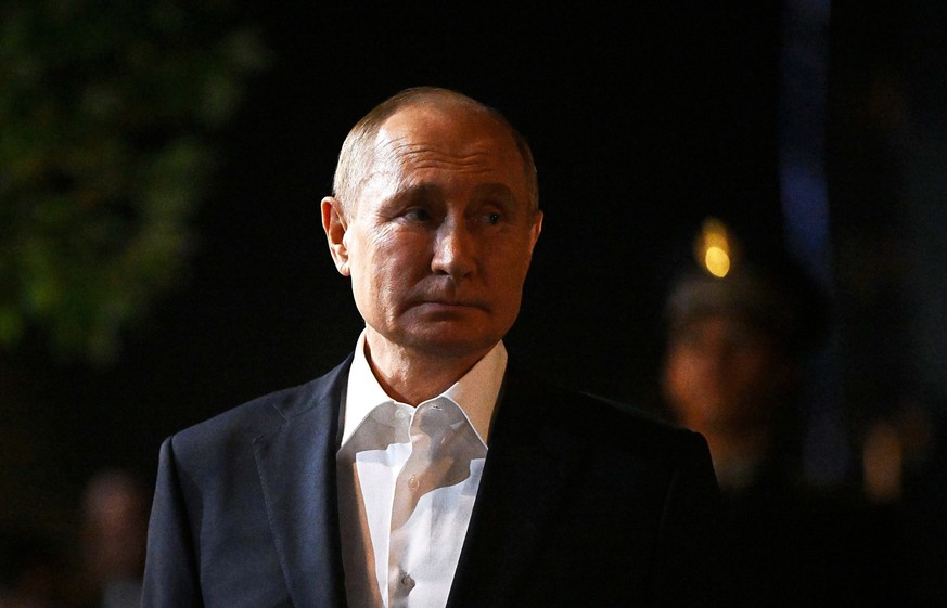 Uzbekistan SCO Putin 8275379 15.09.2022 Russian President Vladimir Putin is seen during a ceremony to plant a tree on the sidelines of the 22nd Shanghai Cooperation Organisation Heads of State Council ...