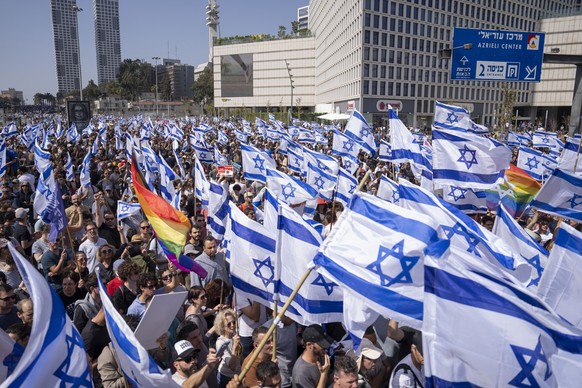 Israelis protest against plans by Prime Minister Benjamin Netanyahu&#039;s new government to overhaul the judicial system, in Tel Aviv, Israel, Wednesday, March 1, 2023. (AP Photo/Oded Balilty)