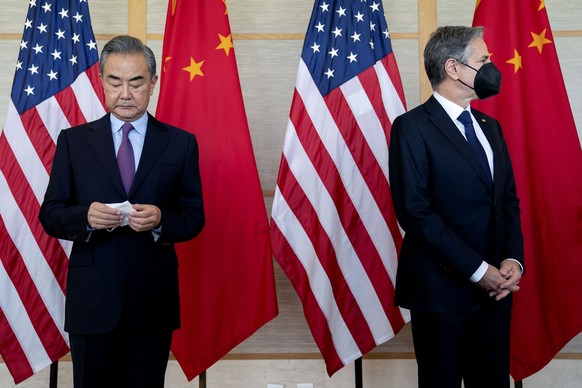 U.S. Secretary of State Antony Blinken, right, and China&#039;s Foreign Minister Wang Yi attend a meeting in Nusa Dua on the Indonesian resort island of Bali Saturday, July 9, 2022. (Stefani Reynolds/ ...
