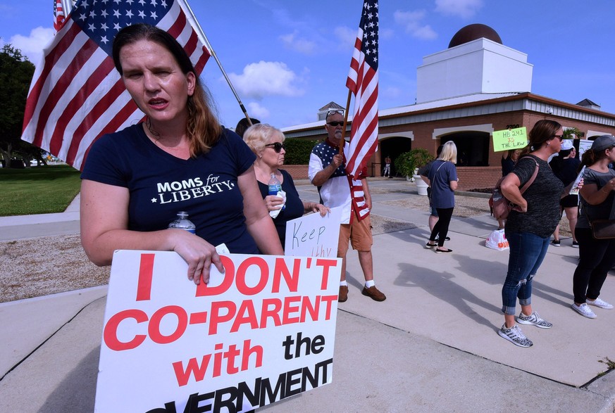 August 30, 2021, Viera, Florida, United States: A member of Moms for Liberty protests against mandatory face masks for students during the COVID-19 pandemic at a meeting of the Brevard County School B ...