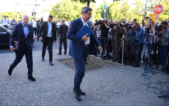 German Christian Social Union (CSU) Bavarian state prime minister Markus Soeder and Edmund Stoiber arrive for a meeting at the CDU headquarters in Berlin, Germany, July 2, 2018. REUTERS/Hannibal Hansc ...