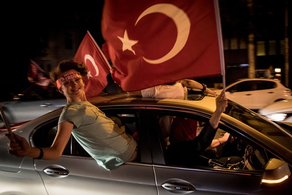 ISTANBUL, TURKEY - JUNE 24: Supporters of Turkey's President Recep Tayyip Erdogan celebrate in their cars on June 24, 2018 in Istanbul, Turkey. Preliminary results point to a victory for President Rec ...